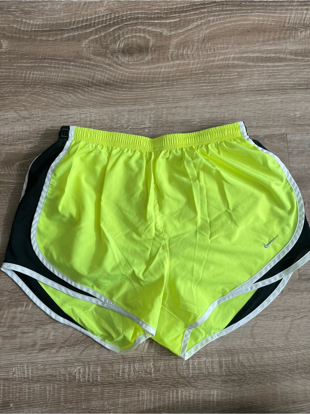 Nike women’s medium tempo running shorts highlighter yellow with black trim